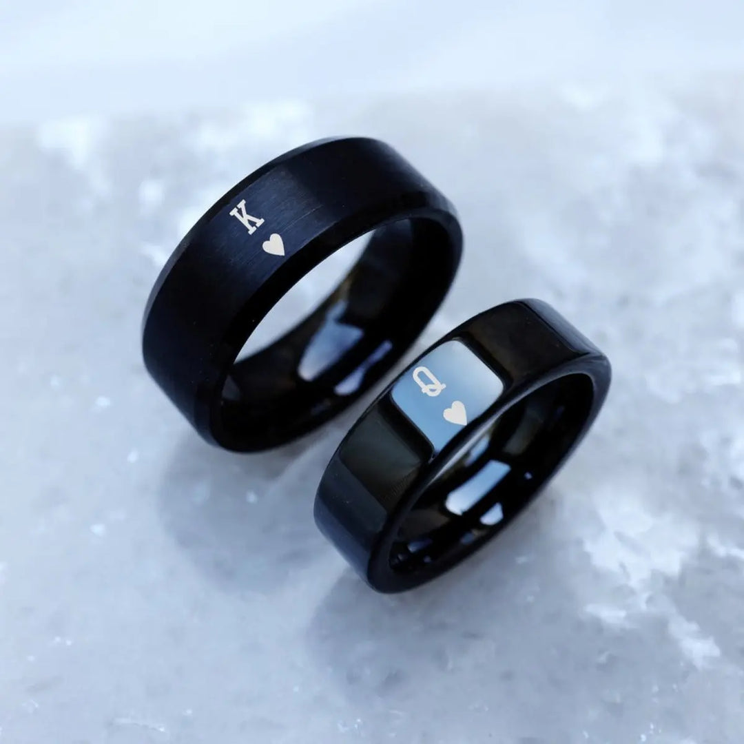 Sleek black Obsession Rings by CouplesChoices.com featuring engraved King and Queen of Hearts symbols—perfectly paired for modern lovers who rule each other’s world.